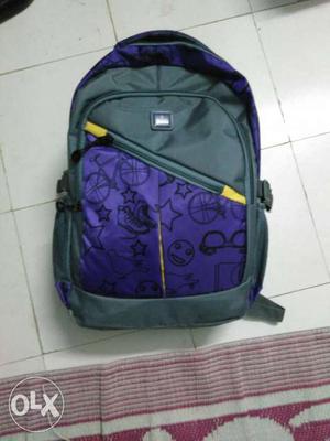 Green And Purple Backpack