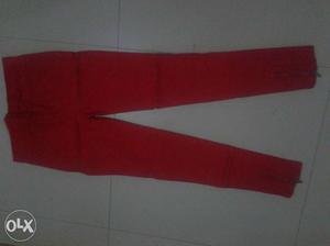 Red coloured jegging, size cm), in a good