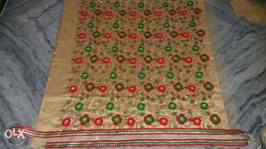 Brown Green And Red Floral Textile