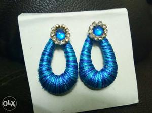 Combination of blue colour silk thread earring