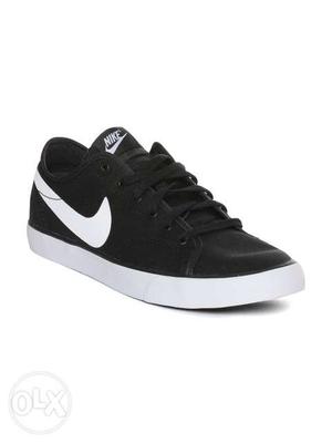 White And Black Nike Low Top Sneakers