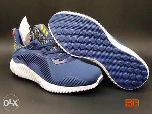 White And Blue Athletic Shoes