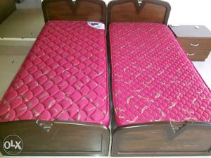 2 single beds along with Godrej mattresses