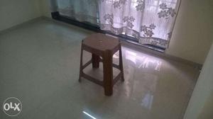 A plastic stool.