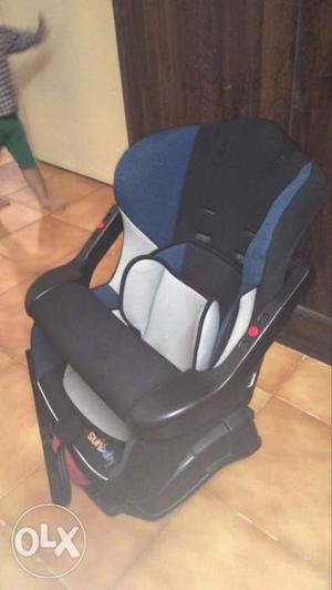 Baby's Blue And Black Convertible Car Seat
