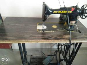 Black Rajesh Sewing Machine with motar 