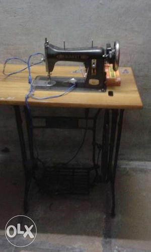 Black Sewing Machine With Table