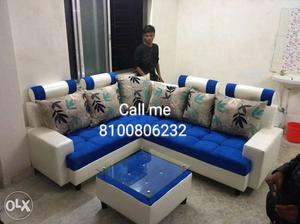 Blue And White Tufted Sectional Sofa With Throw Pillows