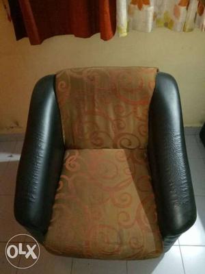 Brown And Black Leather Armchair
