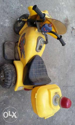 Children's Yellow And Black Ride On Toy