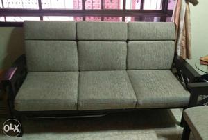 One 3 seater and one 2 seater wooden sofa