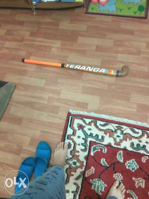 Orange And Brown Teranga hockey stick