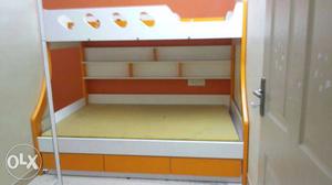 Orange And White Wooden Bunk Bed with storage in excellent