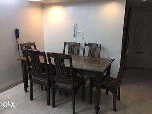 Swastik Solid Wood 6 seater dining table with 6