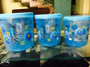 Three Clear Blue Plastic Containers