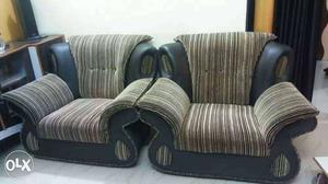 Two Brown And Black Pinstripe Armchairs