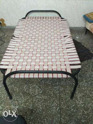 White Red And Gray Folding bed