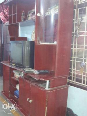 Brown Wooden Cabinet With Tv Hutc And Black Crt Television