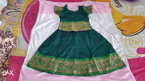 A Green pure silk pavadai dress set for kids