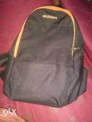 Black And Orange Wildcraft Backpack