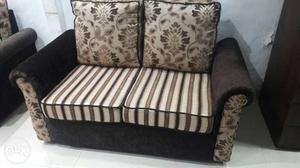 Brown And Black Fabric Loveseat