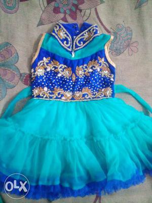 Heavy stone work pretty blue frock suits 1 yr old