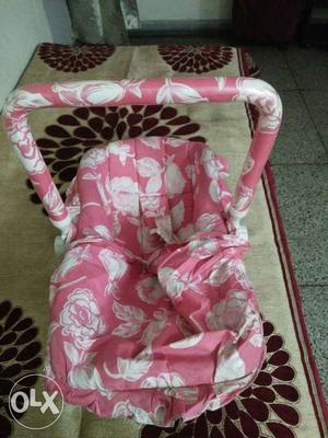Pink And White Floral infant carrier