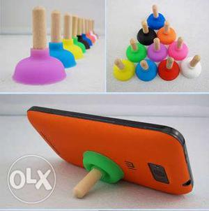 Plunger stand for mobile phones holds your phone
