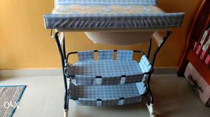 Baby changing table with bathing tub