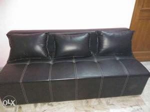 Black Leather Sofa With 3 Throw Pillows