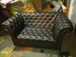 Brown And Black Leather Tufted Chair And A Half