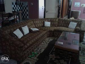 Brown Sectional Couch And Center Table