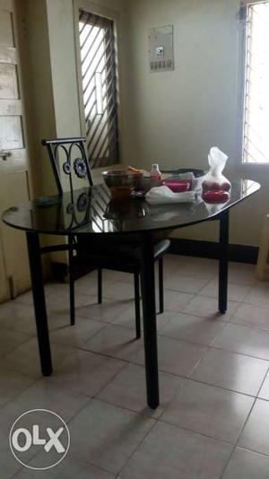 Dining table with four chairs available for sale