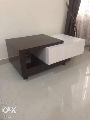 Five months old centre table with drawer.. Glossy