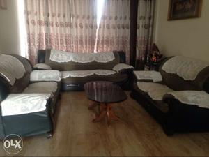 Seven seater sofa with centre table
