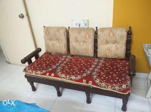 Three seater wooden sofa with wooden center table