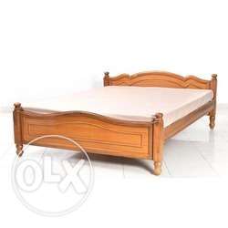 Used wooden cot with mattress