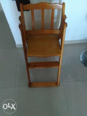 Wooden Baby Highchair in good condition.