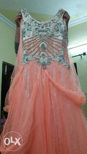 Beautiful peach colour party'gown. price