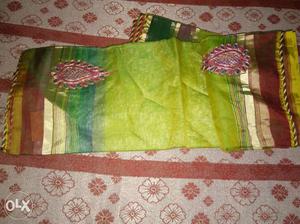 Green, Maroon, And Pink Textile