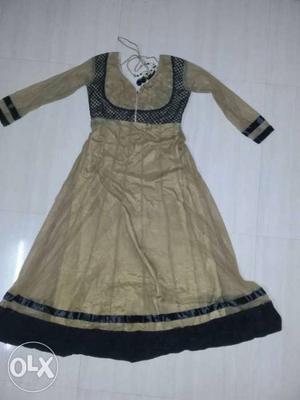 One time use umbrella dress brown colour with black border