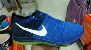 Pair Of Blue-and-black Nike Basketball Shoes