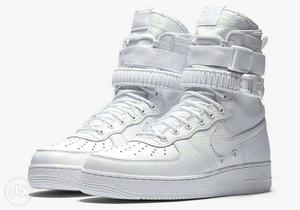 Pair Of White Nike Air Sneakers
