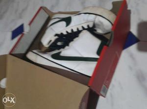 Pair Of White-and-green Nike High Top Sneakers In Box
