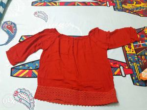 Red off shoulder top. new and unused