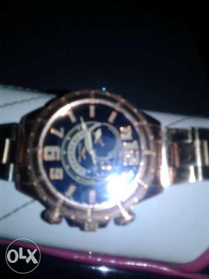 Rose Gold And Black Round Face Wrist Watch
