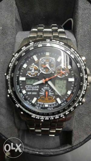 Round Black And Silver Citizen Chronograph Digital Watch