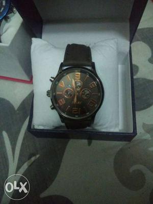 Round Black Chronograph Watch With Black Leather Strap With