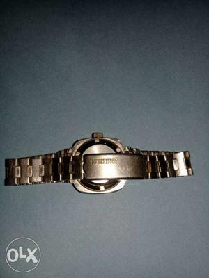 Round Seiko Watch With Silver Link Band