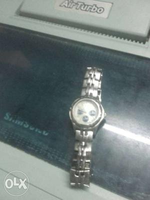 Round Silver And White Chronograph Watch With Link Bracelet